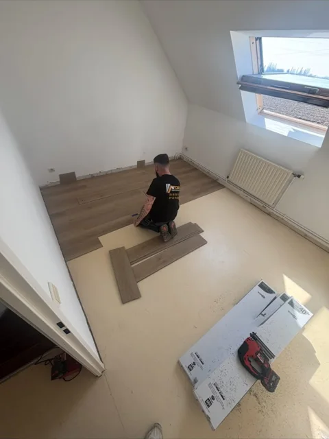 Pose du revêtement en cours